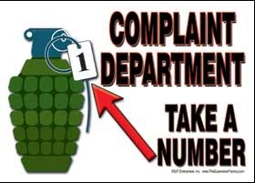 Complaint Department. Take a number (w/a hand pointing to a number placed o… 69006