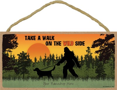Take a walk on the wild side - Bigfoot walking a dog in a forest at sunset 14352